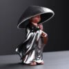 Little Monk With Tea Strainer Hat