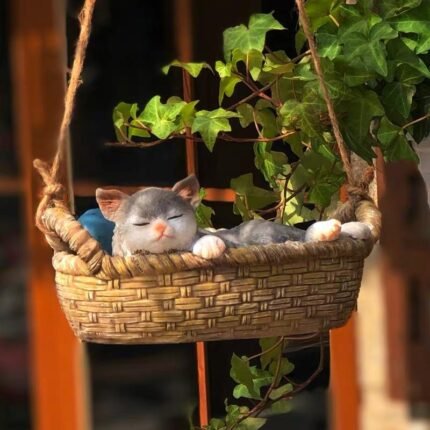 Sleepy Kitten On The Swing